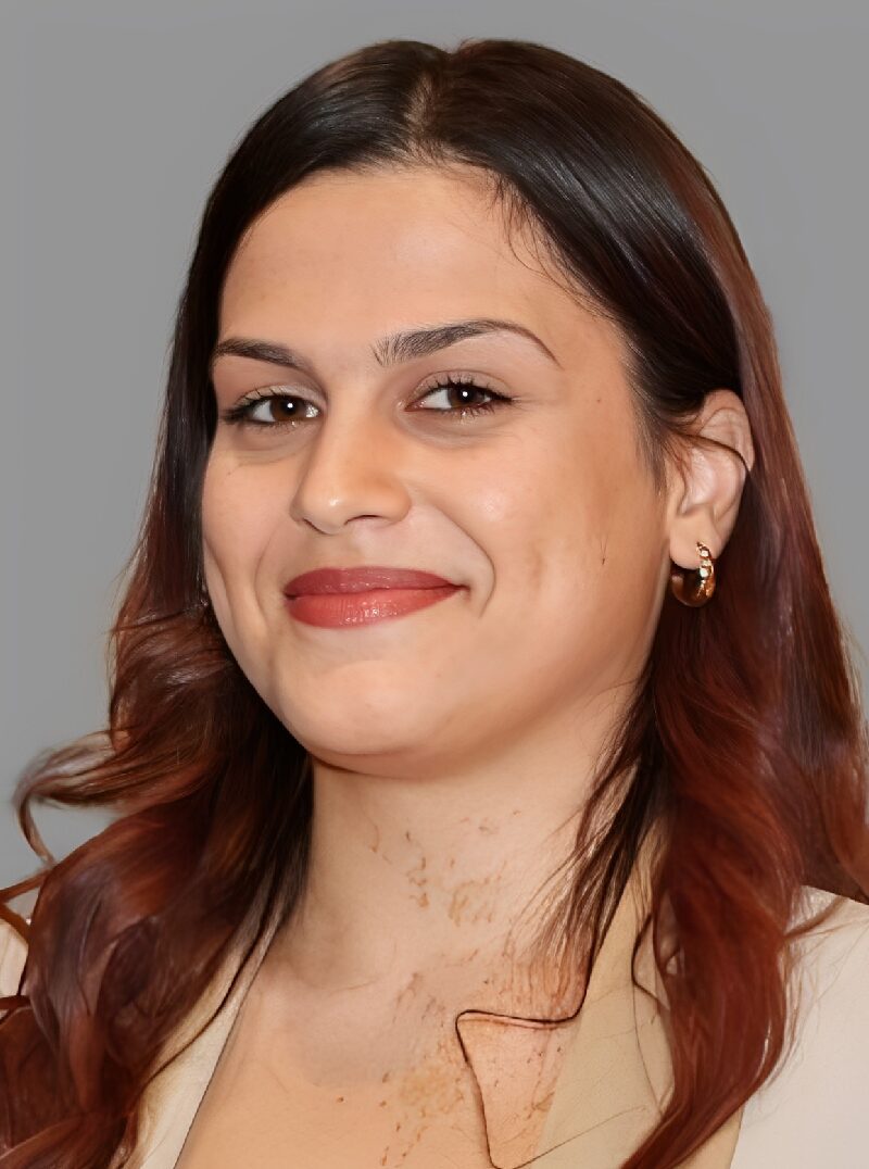 Portrait of a woman in beige outfit